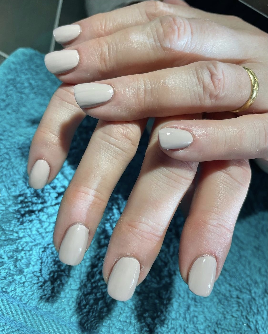 A neutral grey gel manicure